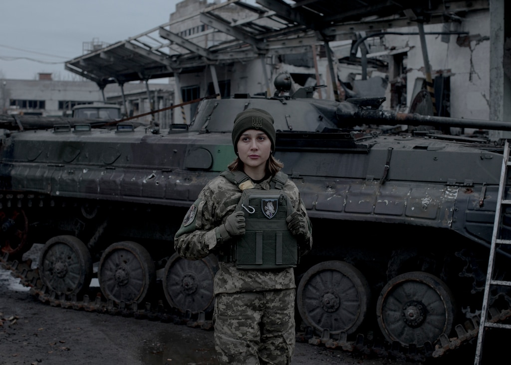 (Emile Ducke | The New York Times)
Anastasia Blyshchyk, a former television journalist who joined the military after her boyfriend was killed in combat, in Izium, Ukraine on Nov. 4, 2022. There are long waiting lists for volunteers eager to serve in the Ukrainian military, and people pull strings to get called up sooner — a contrast to the hundreds of thousands of Russian men fleeing their country to avoid the draft.