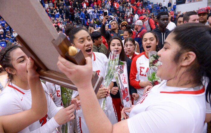 (Leah Hogsten  |  The Salt Lake Tribune) East celebrates the win.  East defeated Timpview 68-48 to win the the 5A High School Girls' Basketball Tournament title at SLCC in Taylorsville, Saturday, Feb. 24, 2018. 