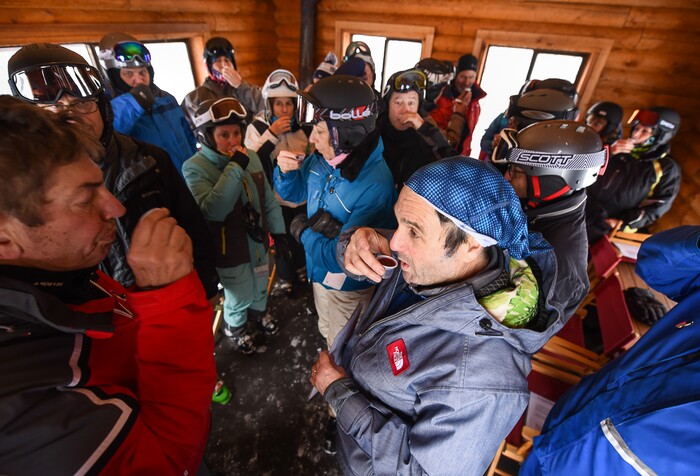 (Francisco Kjolseth | The Salt Lake Tribune) Skiers crowd into Sunset Cabin at Deer Valley Resort for Friday afternoon Jewish Sabbath as they for participate in the Kiddush, the ceremony of prayer and blessing over wine. Jan. 26, 2018.