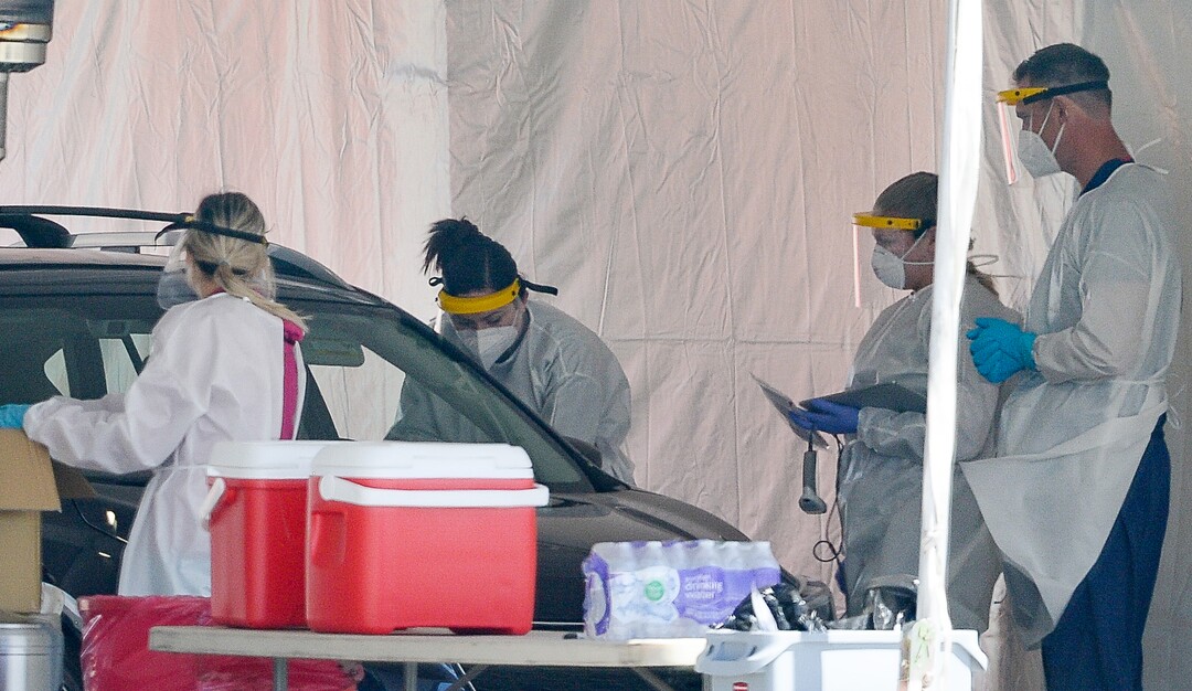 (Francisco Kjolseth | The Salt Lake Tribune) Testing for COVID-19 is performed at the Wasatch County Event Center in Heber City on Wednesday, April 22, 2020, under one of the TestUtah.com contracts the state has with Nomi Health.