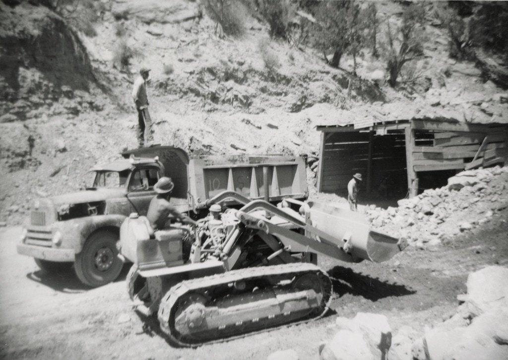 (Utah State Historical Society) Workers at a uranium mine near Moab in the 1950s. The demand for uranium, brought on by the Cold War, fostered a fair number of scam artists selling shares of Utah uranium mines that were not actually created — which prompted the U.S. Securities and Exchange Commission to open its first office in Salt Lake City in 1954.