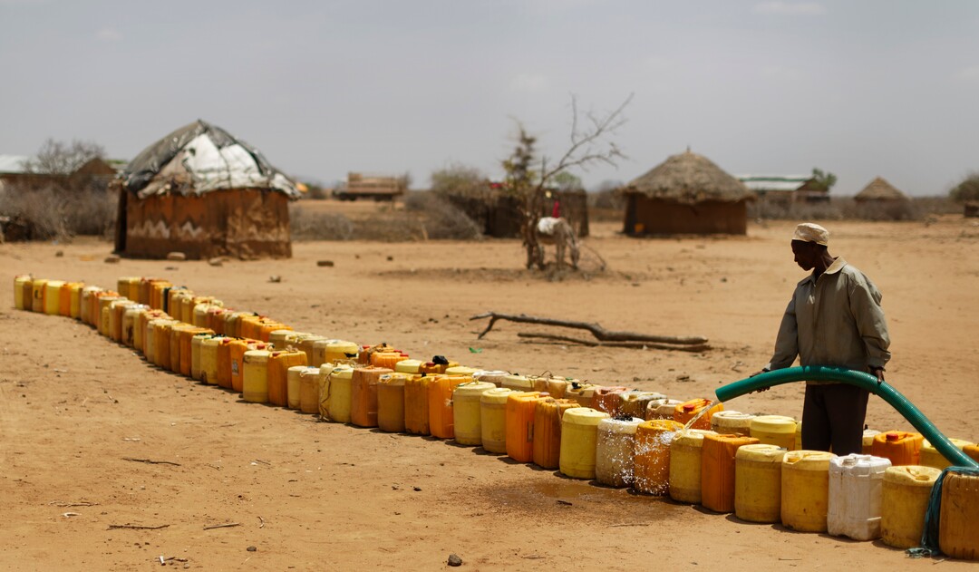 (Ben Curtis  |  AP Photo)  A man fills a long line of plastic water containers from a tanker, in the drought-affected village of Bandarero, near Moyale town on the Ethiopian border, in northern Kenya, Friday, March 3, 2017. The U.N. humanitarian chief, Stephen O'Brien, toured Bandarero village on Friday and called on the international community to act to "avert the very worst of the effects of drought and to avert a famine to make sure we don't go from what is deep suffering to a catastrophe."