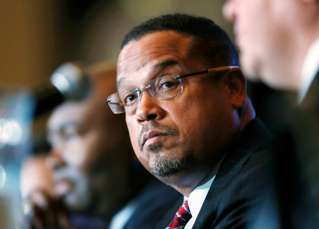 FILE - In this Dec. 2, 2016, file photo, U.S. Rep. Keith Ellison, D-Minn., listens during a forum on the future of the Democratic Party, in Denver. On Sunday, Aug. 12, 2018, Ellison denied an allegation from an ex-girlfriend that he had once dragged her off a bed while screaming obscenities at her. The allegation came just days before a Tuesday primary in which the Democrat is among several running for state attorney general. (AP Photo/David Zalubowski, File)