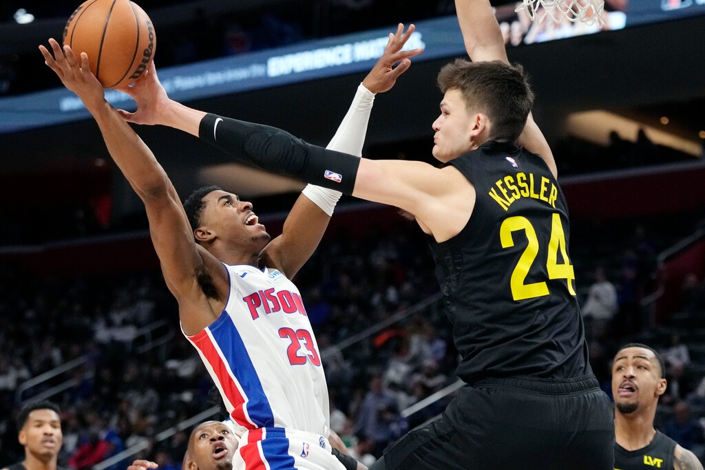 (Carlos Osorio | AP) Utah Jazz center Walker Kessler (24) blocks a shot by Detroit Pistons guard Jaden Ivey (23) during the first half of an NBA basketball game, Thursday, Dec. 21, 2023, in Detroit.