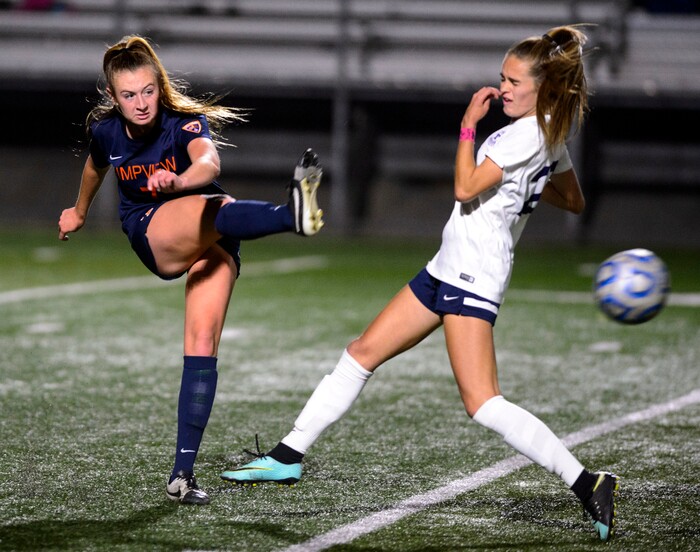 (Steve Griffin | The Salt Lake Tribune) Timpview 's kicks the ball past Timpanogos forward Kara Hartle during their 5A semifinal girl's soccer match at Juan Diego High School in Draper Tuesday October 17, 2017.