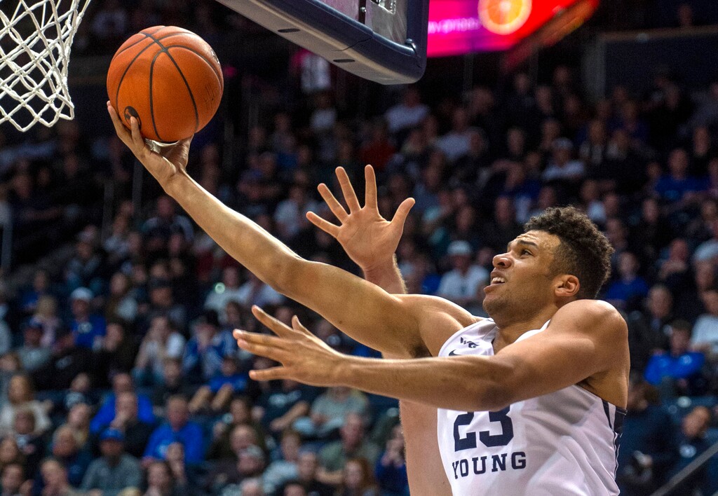 (Rick Egan  |  The Salt Lake Tribune)     Brigham Young forward Yoeli Childs (23) scores for the Cougars, in West Coast Conference basketball acton between the Brigham Young Cougars and the San Francisco Dons, at the Marriott Center, Saturday, Feb. 8, 2020.