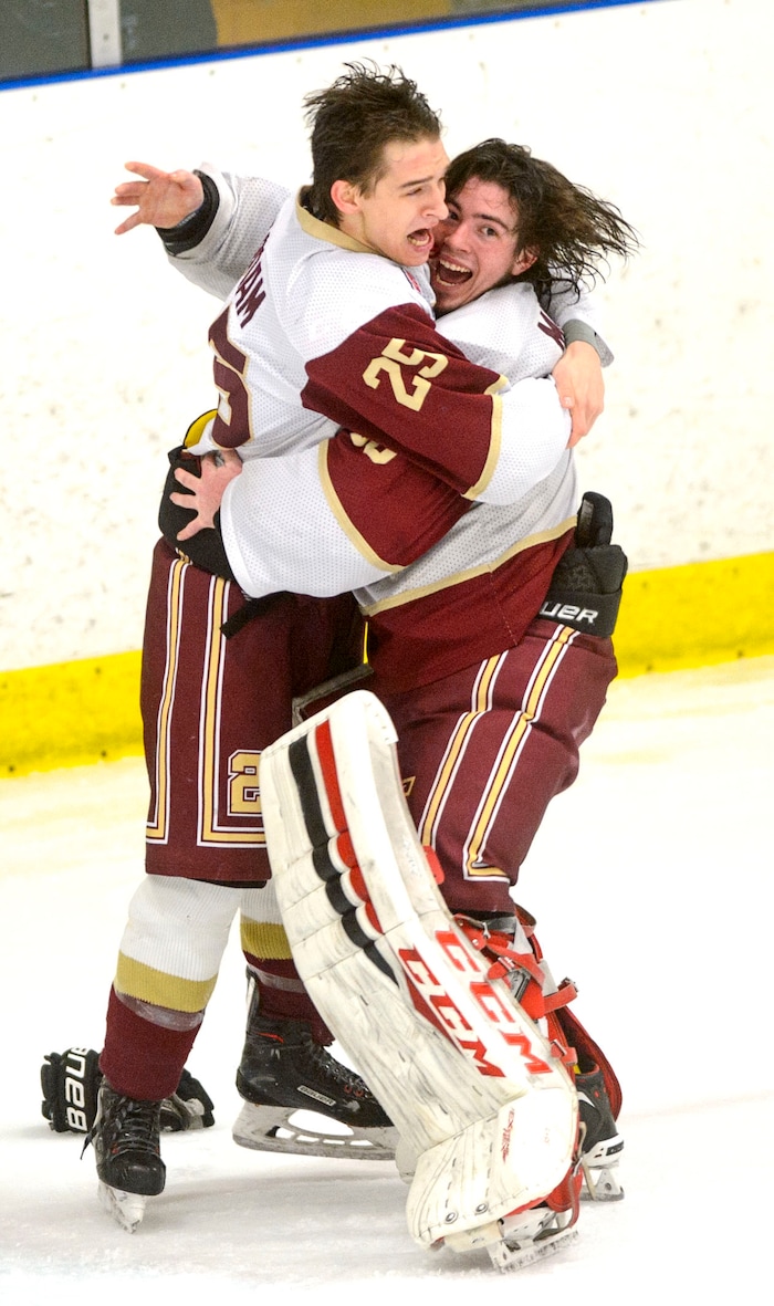 (Steve Griffin  |  The Salt Lake Tribune) Viewmont goalie Keaton Morrison, right and Zac Boam celebrate after defeating Murray for the Division 1 ice hockey state title game at the Salt Lake City Sports Complex in Salt Lake City Tuesday Feb. 20, 2018.