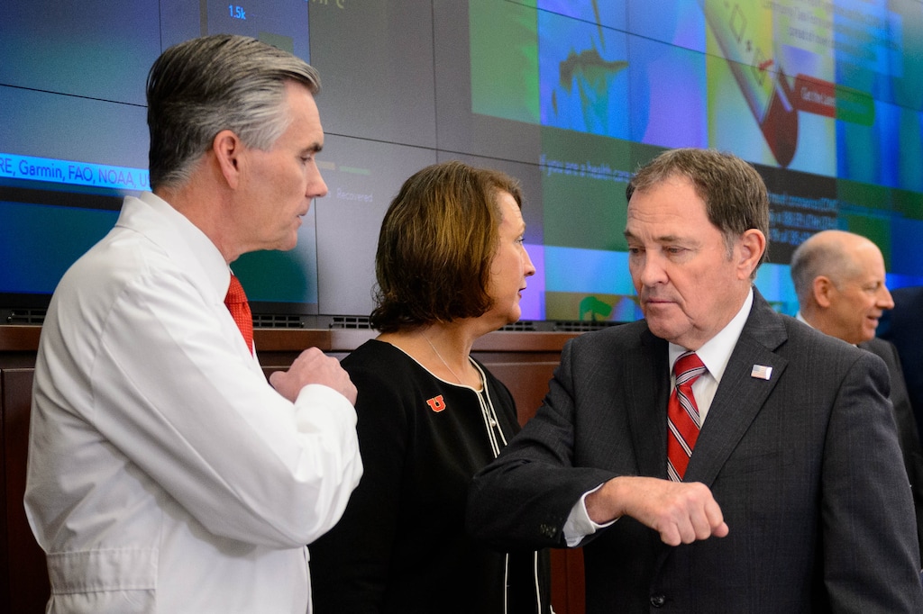 (Trent Nelson | The Salt Lake Tribune) Gov. Gary Herbert bumps elbows with Michael Good after a news conference in the state's Emergency Operations Center on Thursday, March 12, 2020 addressing the current state of COVID-19 in Utah. Representatives from the Utah System of Higher Education, the Utah Board of Education, Utah Jazz, local health authorities and Utah Department of Health were also present.