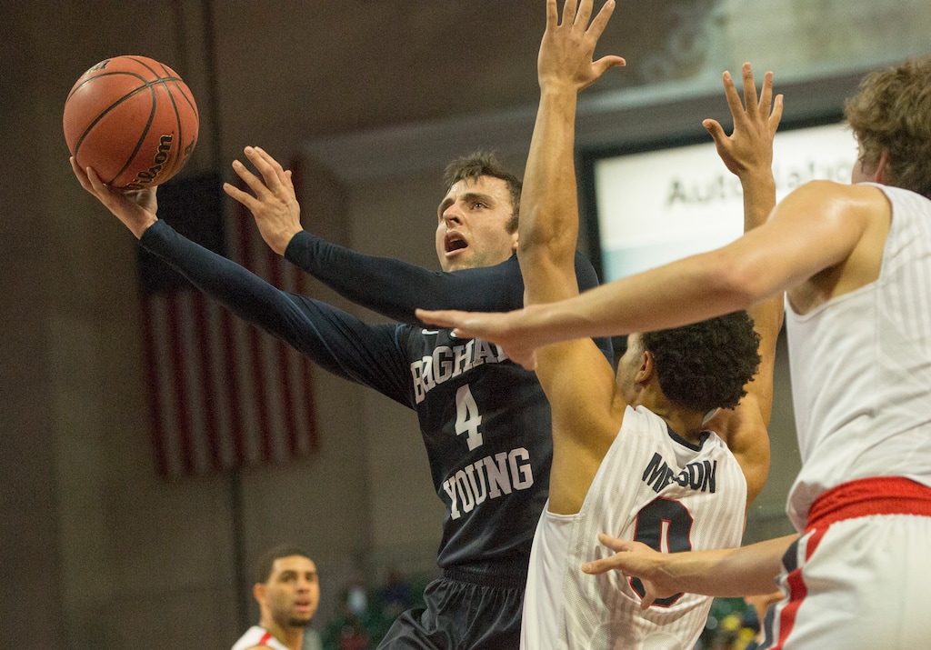 Rick Egan  |  The Salt Lake TribuneBrigham Young Cougars guard Nick Emery (4) goes to the hoop, as Gonzaga Bulldogs guard Silas Melson (0) defends, in the West Coast Conference Semifinals, at the Orleans Arena in Las Vegas, Saturday, March 7, 2016.