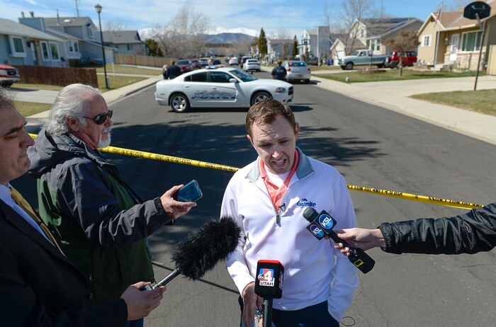 (Francisco Kjolseth | The Salt Lake Tribune) Granite School Communications Director Ben Horsley gives an update at the scene of where a Granite School District police officer shot a driver on Tuesday afternoon, March 20, 2018. While on patrol near Hunter High School, the officer noticed a car full of teenagers and smelled marijuana. When he approached the car lurched and he ended up on the hood. The driver was shot and four other teens in the car fled the scene.