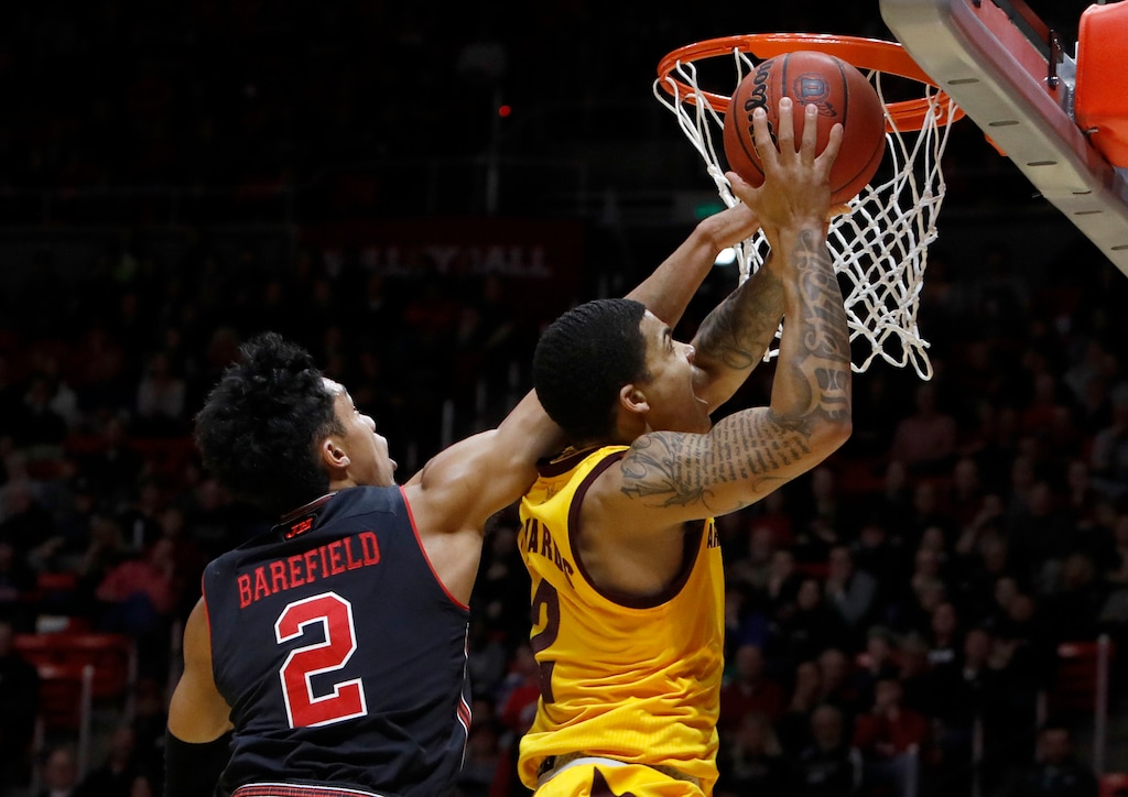 (AP Photo/Kim Raff) Arizona State's Rob Edwards, right, attempts a layup as Utah's Sedrick Barefield defends during the first half of an NCAA college basketball game Saturday, Feb. 16, 2019, in Salt Lake City.