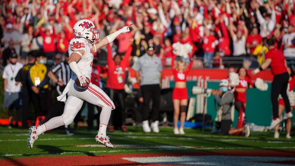 (Trent Nelson  |  The Salt Lake Tribune) Utah Utes wide receiver Britain Covey (18) runs a kick return for a touchdown as the Utah Utes face the Ohio State Buckeyes at the Rose Bowl in Pasadena, Calif., on Saturday, Jan. 1, 2022.
