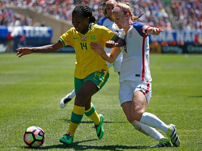 South Africa forward Sanah Mollo, left, and United States defender Becky Sauerbrunn battle for the ball during the second half of the international friendly women's soccer match in Chicago, on Saturday, July 9, 2016. United States won 1-0. (AP Photo/Nam Y. Huh)
