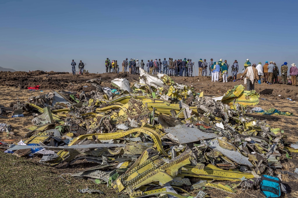 (Mulugeta Ayene | AP file photo) In this March 11, 2019, file photo, wreckage is piled at the crash scene of an Ethiopian Airlines flight crash near Bishoftu, Ethiopia. A published report says pilots of an Ethiopian airliner that crashed followed Boeing’s emergency steps for dealing with a sudden nose-down turn but couldn’t regain control.