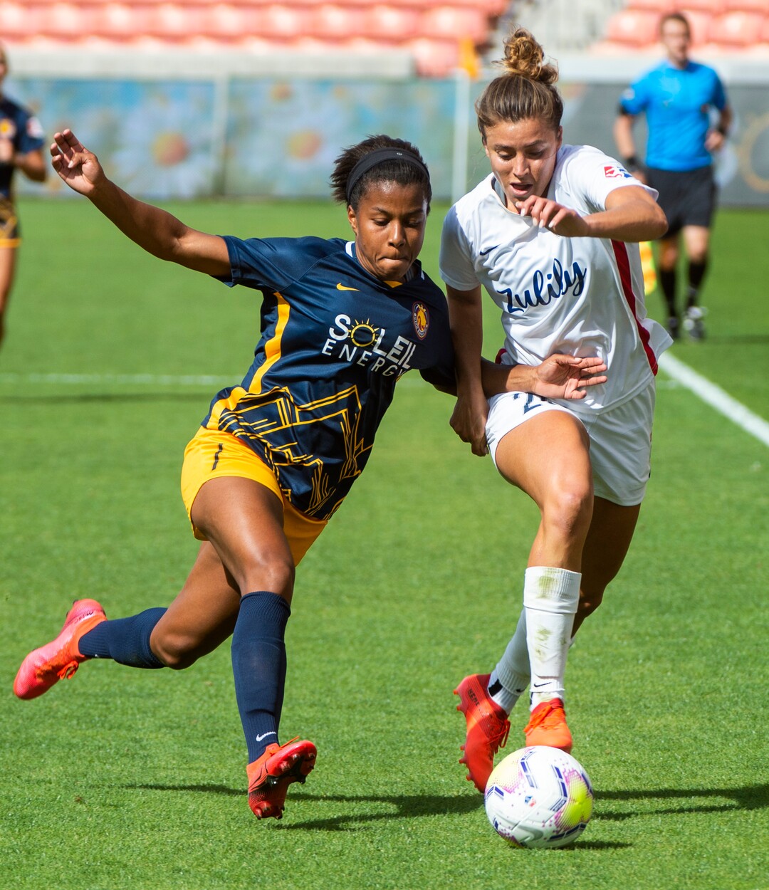 (Rick Egan  |  The Salt Lake Tribune) Utah Royals FC midfielder  Elizabeth Ball (7) goes for the ball along with OL Reign FC attacker SofiaHuerta, in soccer action between Utah Royals FC and Ol Reign FC at Rio Tinto Stadium in Sandy, Saturday, Sept. 26, 2020.