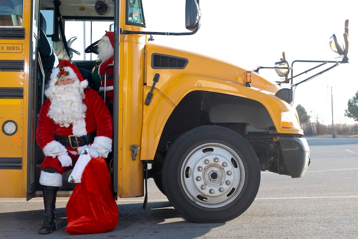 Don Fitch poses for a portrait in his bus on Tuesday, Dec. 19, 2017, in American Fork, Utah.  Fitch has driven school buses for the Alpine School District for the past four years. Every year around Christmas, he decorates the bus’s interior with Christmas decorations, plays Christmas music and dresses up as Santa.   (Evan Cobb /The Daily Herald via AP)