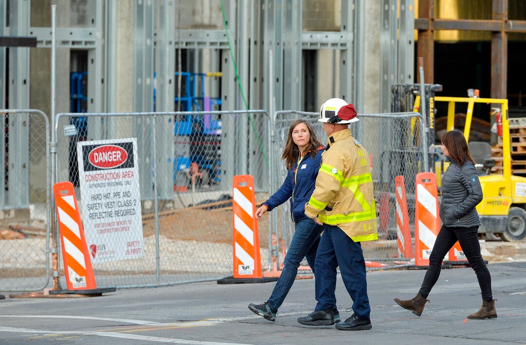 (Chris Samuels | The Salt Lake Tribune) Salt Lake City Mayor Erin Mendenhall talks with Salt Lake City Fire Department Chief Karl Lieb after a four-alarm fire in a new construction of apartment residences in Sugar House, Wednesday, Oct. 26, 2022.