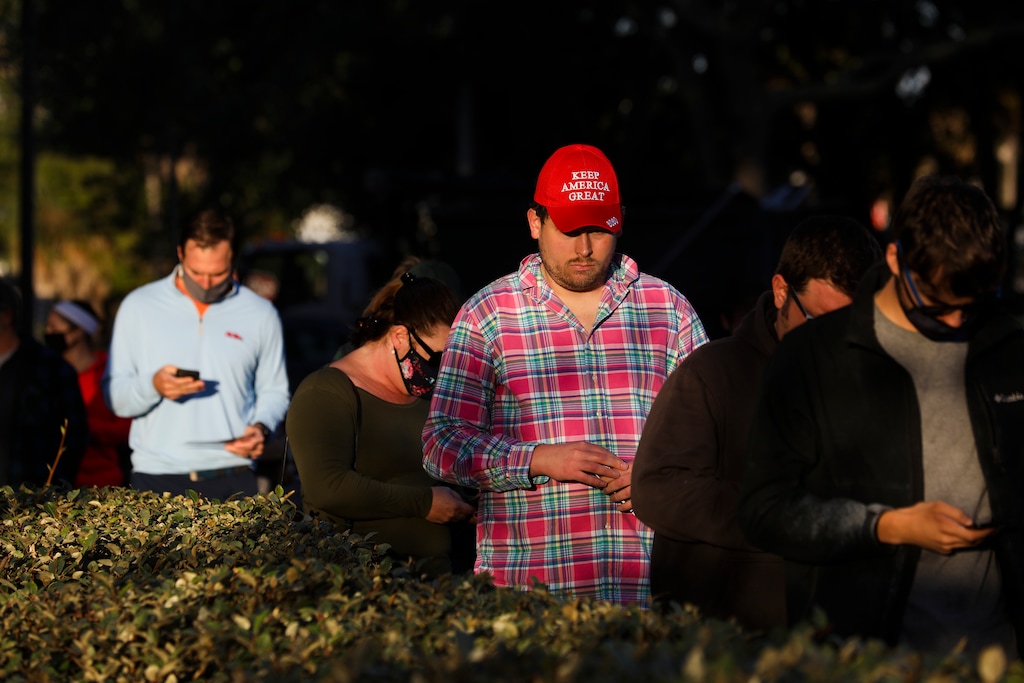 (Eve Edelheit | The New York Times)
Voters wait in a line outside of a polling location in St. Petersburg, Fla., Nov. 3, 2020. "Far from overwhelming the Republican Party and sweeping it out of power, the extraordinarily high turnout of the 2020 presidential election probably saved its political prospects," writes New York Times columnist Jamelle Bouie.