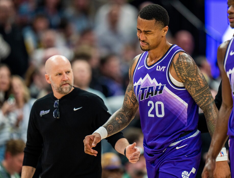 (Rick Egan | The Salt Lake Tribune) Utah Jazz forward John Collins (20) walks to the locker room after Minnesota Timberwolves guard Anthony Edwards (5) knocked him to the ground on a dunk, in NBA action at the Delta Center, on Monday, March 18, 2024.