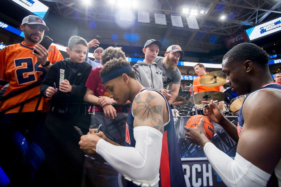 (Leah Hogsten  | The Salt Lake Tribune)  Auburn Tigers guard Bryce Brown (2) and Auburn Tigers guard Jared Harper (1) sign autographs for fans after they beat Kansas in the second round of the NCAA tournament in Salt Lake City on Saturday, March 23, 2019.