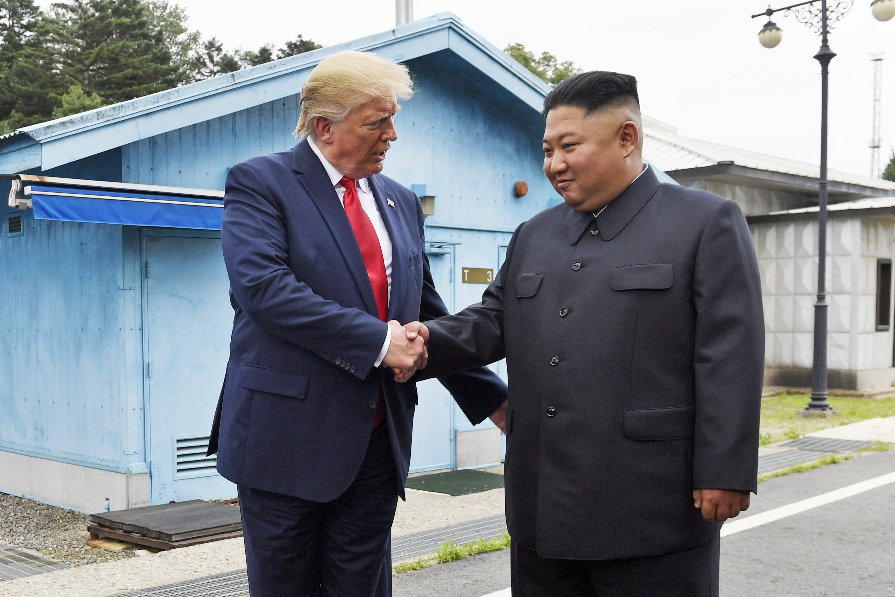 (Susan Walsh | AP file photo)  President Donald Trump shakes hands with North Korean leader Kim Jong Un at the border village of Panmunjom in the Demilitarized Zone, South Korea, on June 30, 2019.