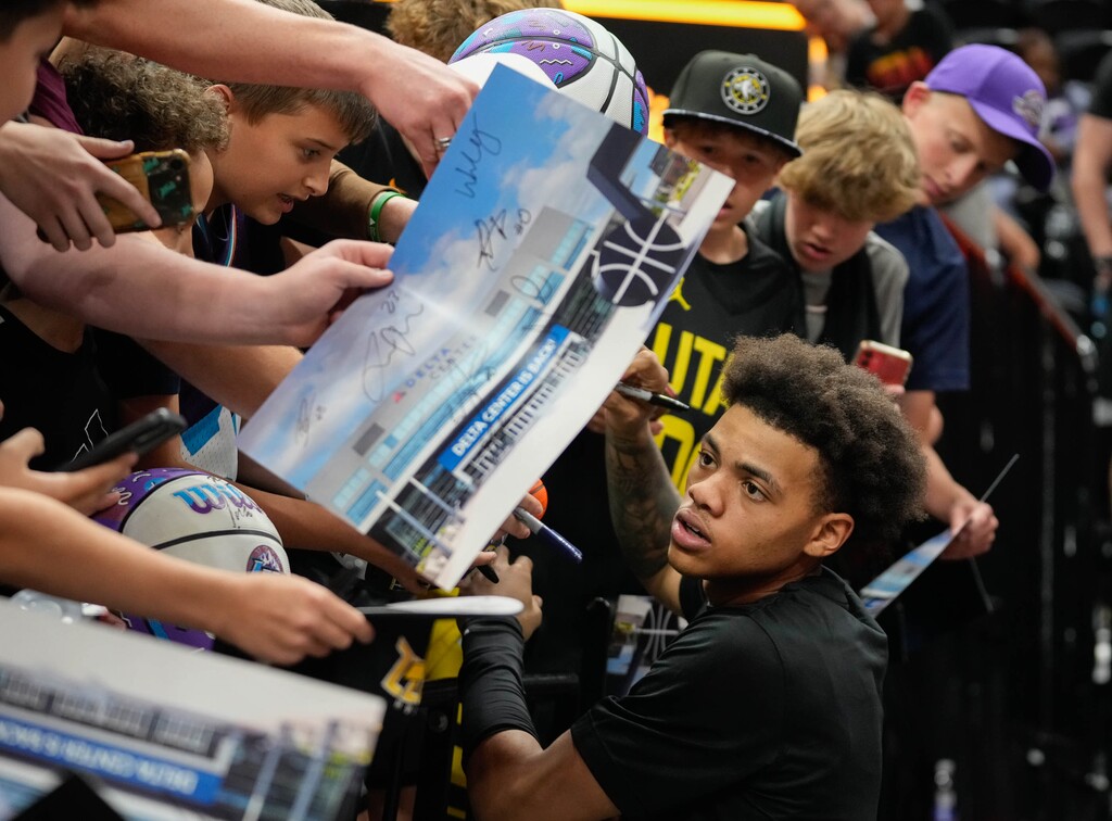 (Francisco Kjolseth | The Salt Lake Tribune) Utah Jazz guard Keyonte George (3) signs autographs following an NBA Summer League basketball game against the 76ers Wednesday, July 5, 2023, at the Delta Center in Salt Lake City.