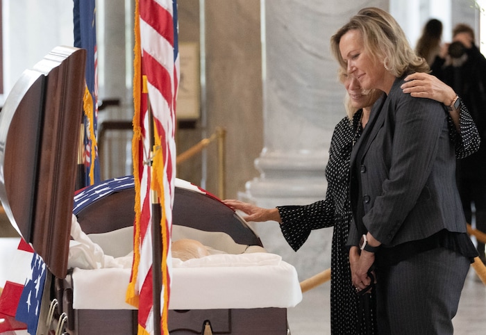 (Francisco Kjolseth | The Salt Lake Tribune) Former Sen. Orrin Hatch’s daughters Kim Hatch Catron and Alysa Whitlock pay their respects to their father prior to a public viewing for the senator at the Utah Capitol on Wednesday, May 4, 2022. Hatch, the longest-serving Republican senator in U.S. history and the longest-serving from Utah, died April 23 at age 88.
