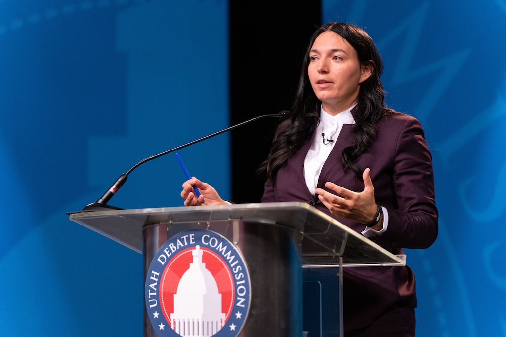 (Xiangyao "Axe" Tang | Pool) January Walker speaks in a 4th Congressional District debate at the University of Utah in Salt Lake City, Wednesday, Oct. 12, 2022.