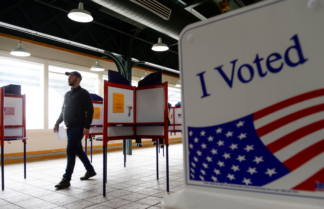 (Leah Hogsten  |  The Salt Lake Tribune) Voters cast their ballots at Ogden's Union Station during Utah's Super Tuesday primary, Mar. 3, 2020,