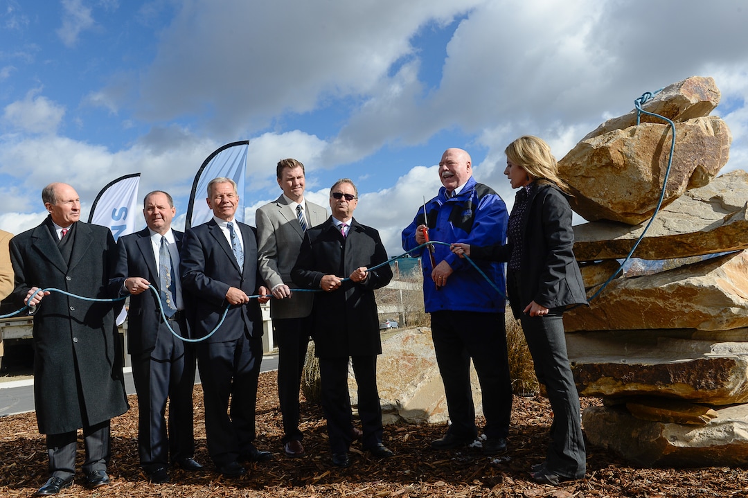 Francisco Kjolseth  |  The Salt Lake TribuneSandy officials, including Mayor Tom Dolan, second from right, hold a "climbing rope" cutting event at the site of the future Prestige, a 25-story high-rise residential building in the heart of a new 1,100 acre city center called "The Cairns." The project from 90th S. to 114th S., and I-15 to UTA light rail calls for 20 million square feet of development.