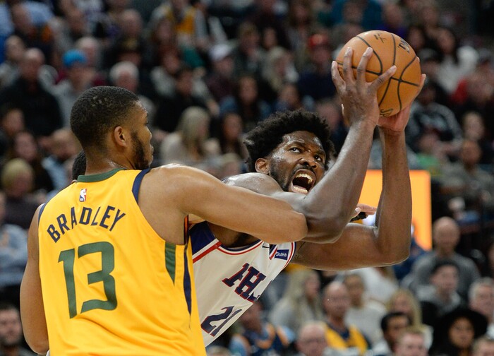 (Francisco Kjolseth  |  The Salt Lake Tribune)  Utah Jazz center Tony Bradley (13) pressures Philadelphia 76ers center Joel Embiid (21) as the Utah Jazz host the Philadelphia 76ers in their NBA basketball game at Vivint Smart Home Arena in Salt Lake City on Wednesday, Nov. 6, 2019.