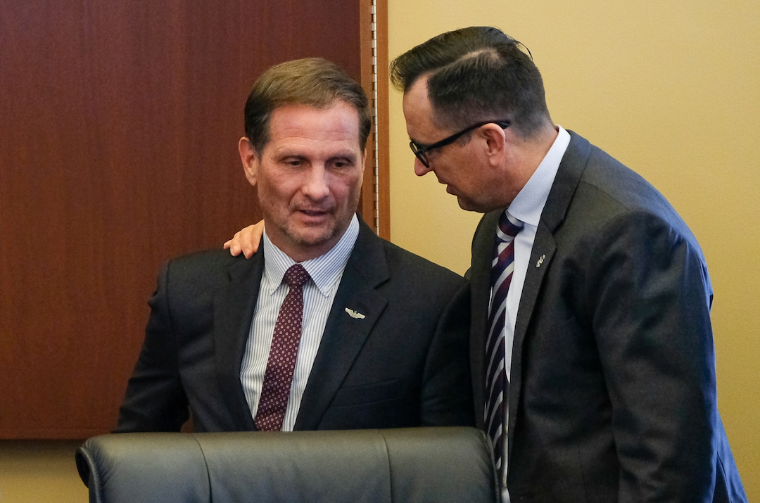 (Francisco Kjolseth  |  The Salt Lake Tribune)  Congressman Chris Stewart, left, speaks with House speaker Greg Hughes following comments in the majority caucus meeting by the congressman on day two of the 2018 legislative session on Tuesday, Jan. 23, 2018.