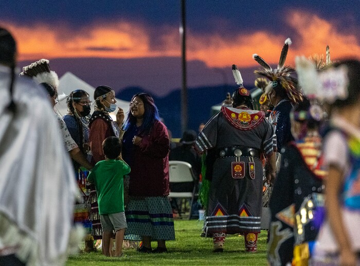 (Leah Hogsten | The Salt Lake Tribune  Indigenous members from tribes all over the West are welcomed enjoy the first evening of the 41st Annual Paiute Indian Tribe of Utah Restoration Gathering, Aug. 13, 2021 in Cedar City, Utah.