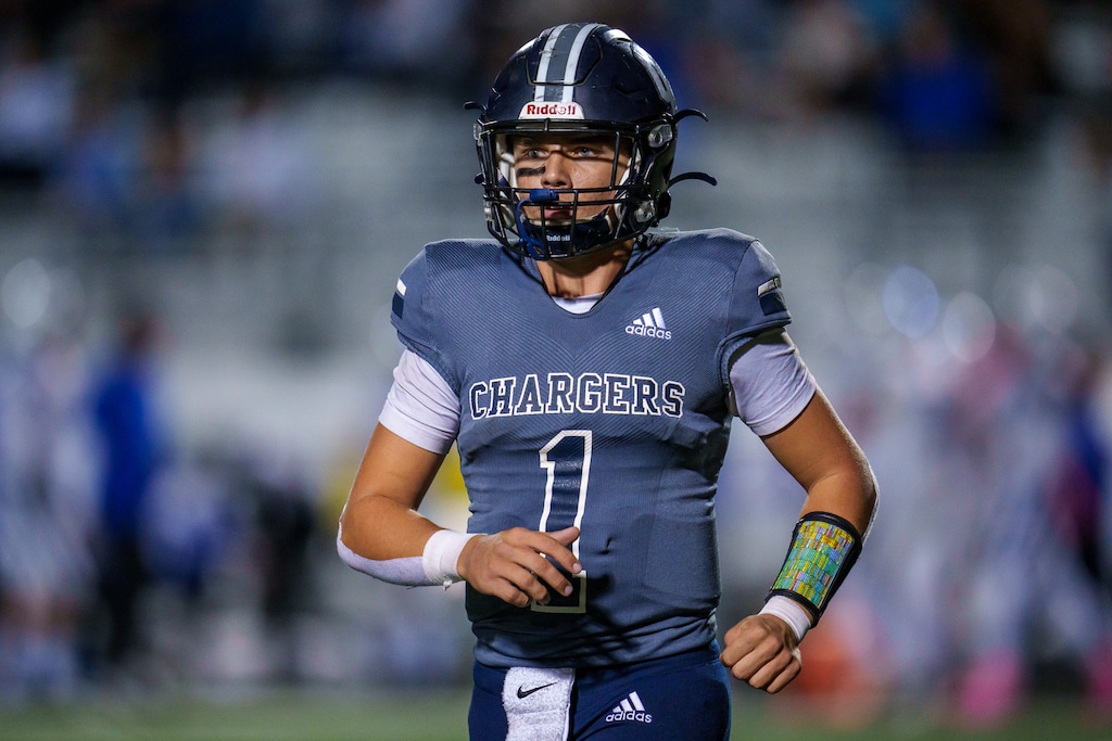 (Trent Nelson  |  The Salt Lake Tribune) Corner Canyon quarterback Isaac Wilson in action vs Pleasant Grove, in Draper on Wednesday, Oct. 12, 2022.
