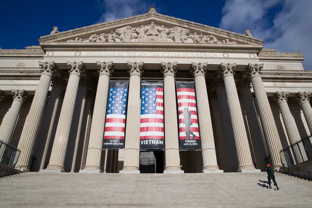 (Alex Brandon | The Associated Press) People walk up the steps even though the National Archives is closed with the partial government shutdown, Saturday, Dec. 22, 2018 in Washington.