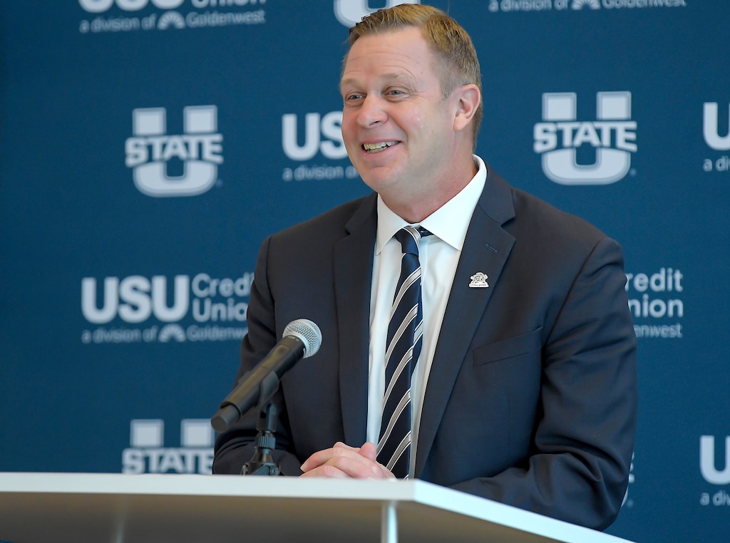 (Eli Lucero | Herald Journal) Bronco Mendenhall speaks at a press conference where he was introduced as the new football coach at Utah State University, Monday Dec. 9, 2024, in Logan.