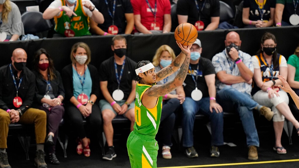 Utah Jazz guard Jordan Clarkson shoots against the Denver Nuggets during the first half of an NBA basketball game Friday, May 7, 2021, in Salt Lake City. (AP Photo/Rick Bowmer)