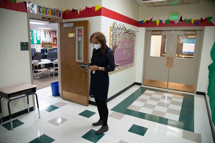 (Francisco Kjolseth | The Salt Lake Tribune) Glenda Woodring, who teaches 4th grade at Jackson Elementary, tries to connect to the internet as she sees her first day of school online cut short due to the wind storm on Tuesday, Sept. 8, 2020, that left many of hers students unable to log in due to power outages.