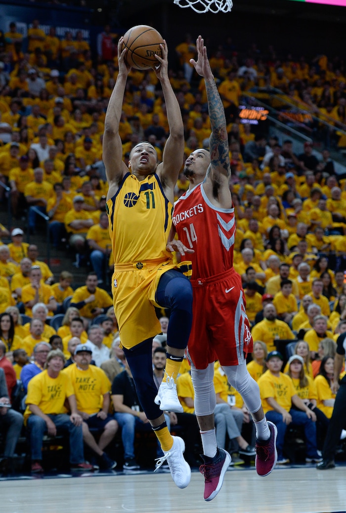 (Francisco Kjolseth | The Salt Lake Tribune) Utah Jazz guard Dante Exum (11) gets the ball past Houston Rockets guard Gerald Green (14) in the first half of Game 4 of the NBA playoffs at the Vivint Smart Home Arena Sunday, May 6, 2018 in Salt Lake City.