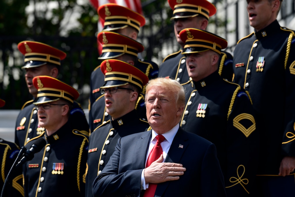 (AP Photo/Susan Walsh) President Donald Trump participates in a "Celebration of America" event on the South Lawn of the White House in Washington, Tuesday, June 5, 2018. Trump quickly scheduled the event with military bands after canceling a visit with the Philadelphia Eagles as he stoked fresh controversy over players who protest racial injustice by taking a knee during the national anthem.
