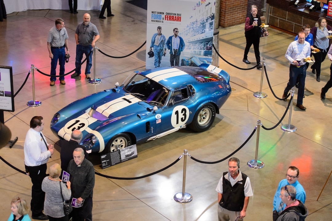 (Trent Nelson  |  The Salt Lake Tribune)Megaplex Theatres celebrates its 20th anniversary with an event at The District location in South Jordan on Thursday Nov. 14, 2019. On display is a 1964 Shelby Cobra Daytona Coupe.
