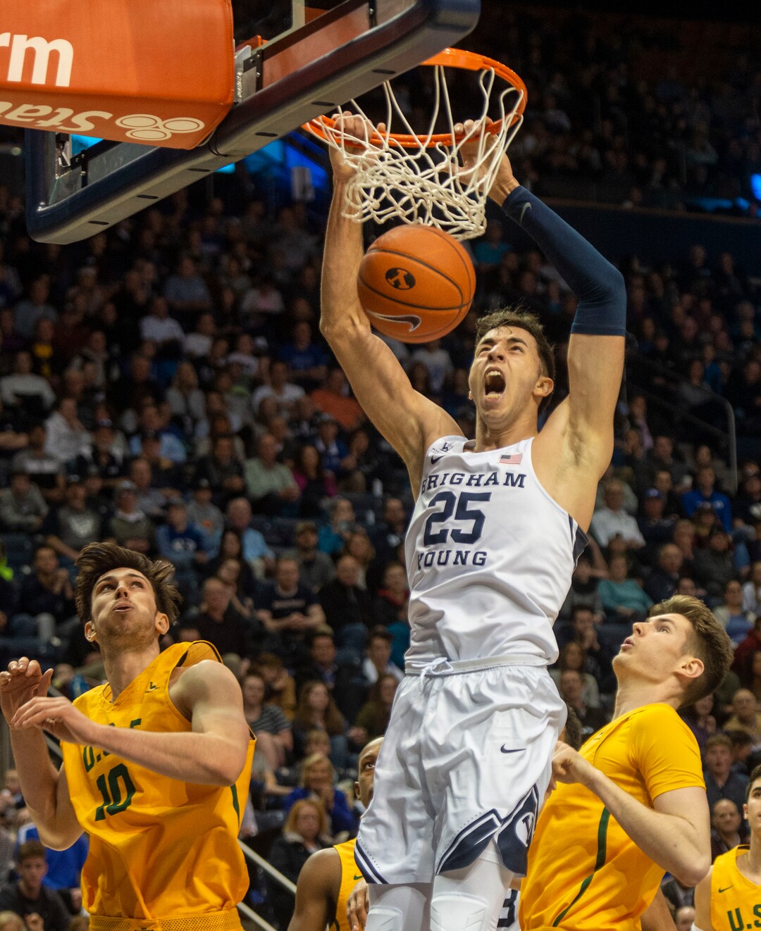 (Rick Egan  |  The Salt Lake Tribune)      Brigham Young forward Gavin Baxter (25) dunks the ball for the Cougars, in WCC basketball action between Brigham Young Cougars and San Francisco Dons, at the Marriott  Center, Thursday, February 21, 2018.