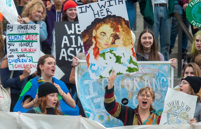 (Rick Egan  |  The Salt Lake Tribune)      Hundreds of students from around the state chant and sing as they gather on the steps of the Utah State Capitol Building, demanding action on the climate crisis. Friday, Sept. 20, 2019.