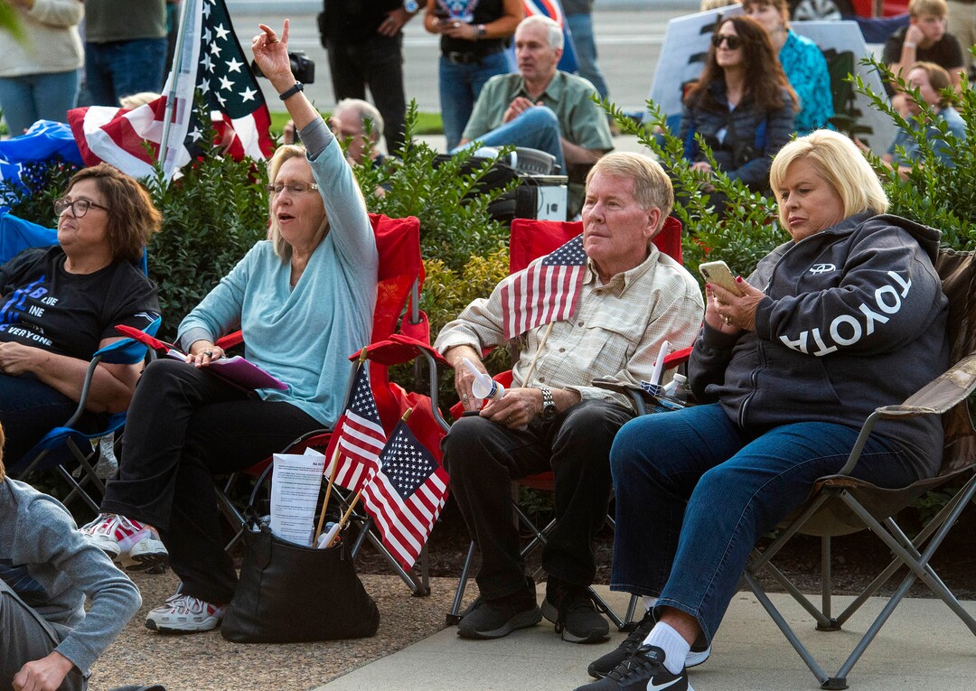 (Rick Egan  |  The Salt Lake Tribune)     Several people carried guns, but no one was wearing masks, as a couple of hundred people gather at the Provo Courthouse for the Utah County Freedom Rally on Friday, Oct. 2, 2020.