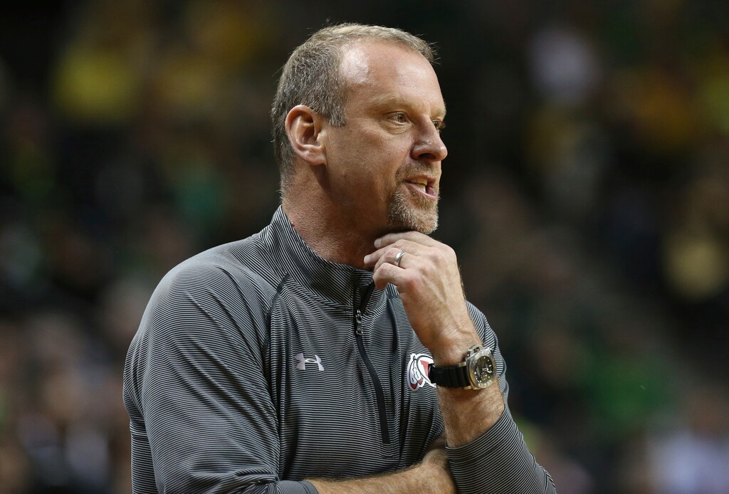 Utah coach Larry Krystkowiak calls to his team during the first half of the team's NCAA college basketball game against Oregon on Thursday, Feb. 16, 2017, in Eugene, Ore. (AP Photo/Chris Pietsch)