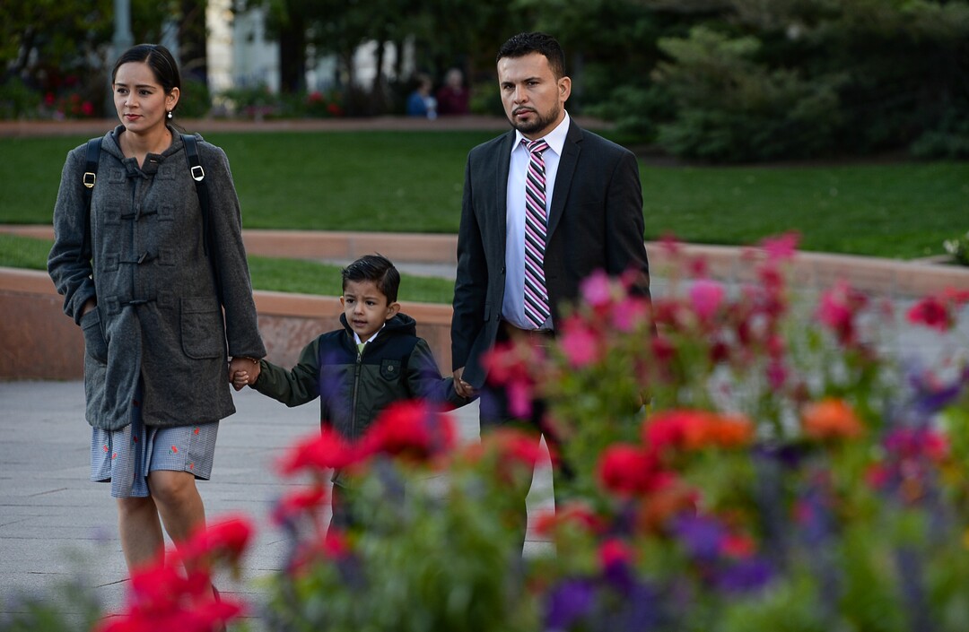 (Francisco Kjolseth  |  The Salt Lake Tribune)  Jesus Abram Alvarado, 5, holds hands with his parents, Elisabeth and Leonel Alvarado, as people arrive for the Sunday session of the 189th twice-annual General Conference of The Church of Jesus Christ of Latter-day Saints at the Conference Center in Salt Lake City on Sunday, Oct. 6, 2019.
