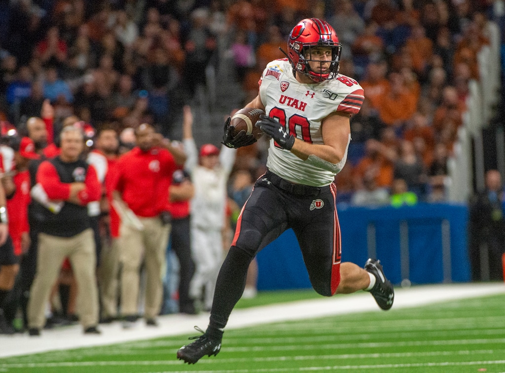(Rick Egan  |  The Salt Lake Tribune)   Utah tight end Brant Kuithe (80) runs for the Utes, in Alamo Bowl football action, between the Utes and the Texas Longhorns, in San Antonio, Tuesday, Dec. 31, 2019.
