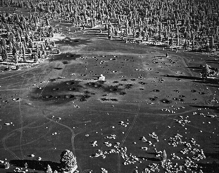 (U.S. Geological Survey Astrogeology Science Center via AP) This 1968 photo provided by the U.S. Geological Survey Astrogeology Science Center shows man-made craters in a volcanic cinder field east of Flagstaff, Ariz. Astronauts who walked on the moon used the site for training.