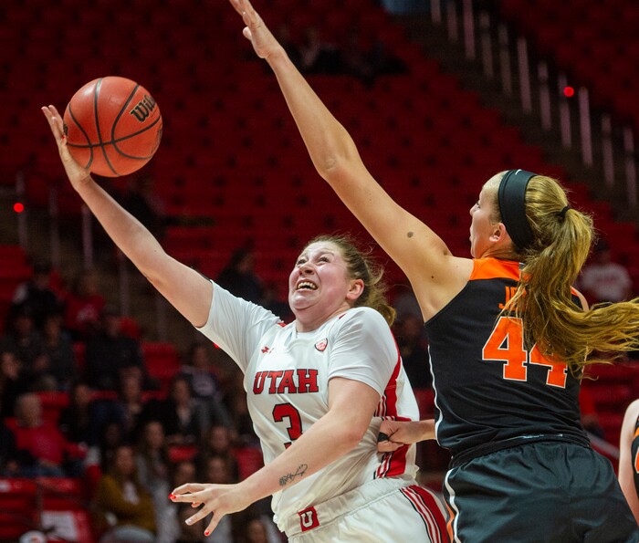 (Rick Egan  |  The Salt Lake Tribune)     Utah Utes forward Andrea Torres (3) takes the ball to the hoop, as Oregon State Beavers forward Taylor Jones (44) defends, in PAC-12 basketball action between the Utah Utes and the Oregon State Beavers at the Jon M. Huntsman Center, Saturday, Feb. 1, 2020.