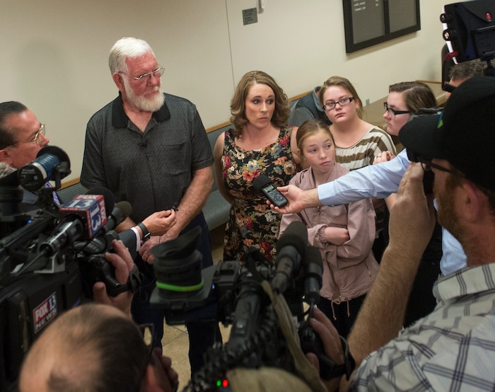     (Rick Egan  |  The Salt Lake Tribune)       Bill Powell, Riley’s father, and Breezy's aunt, Amanda Hunt talk to the media after Jerrod Baum appeared for a hearing in Provo. Baum is accused of killing 18-year-old Riley Powell and 17-year-old Brelynne “Breezy” Otteson in December and dumping their bodies into an abandoned mine shaft. Thursday, April 26, 2018.   

